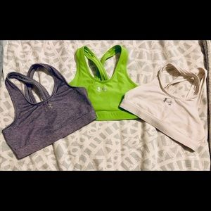 Three Under Armour Sports Bras